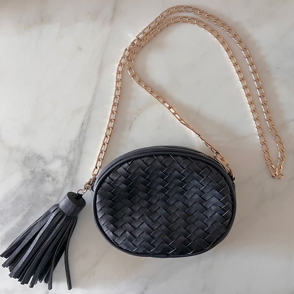 Deux Lux _ navy braided crossbody bag with gold chain + tassel.